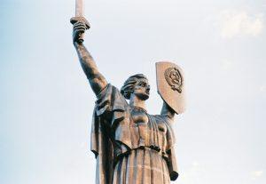 angel statue under white sky during daytime
